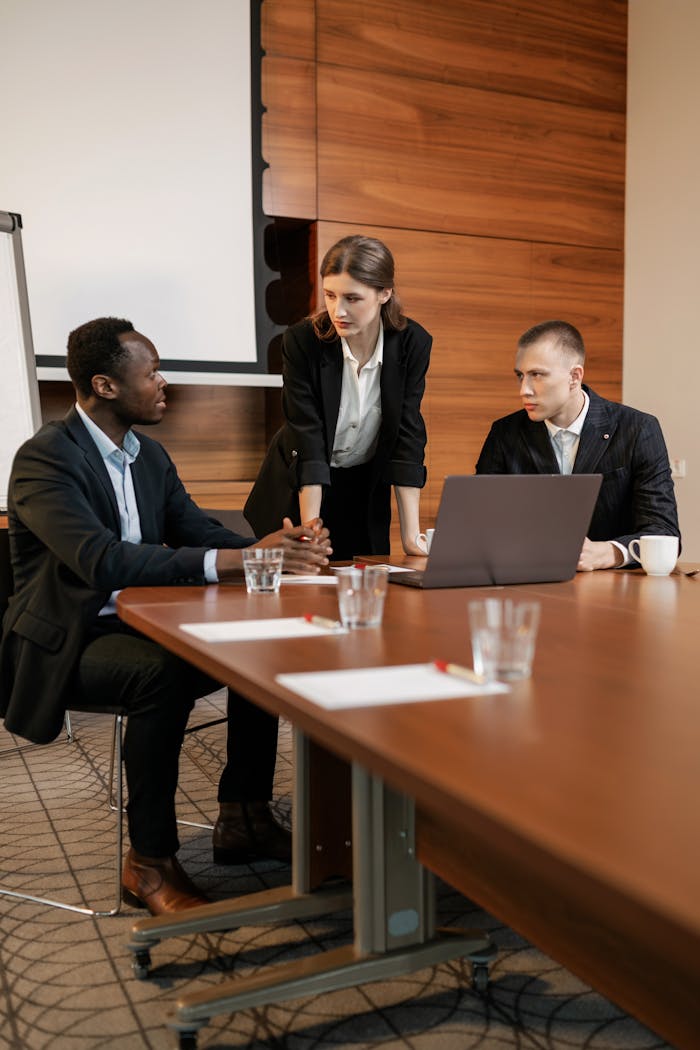 Professional team discussing projects in a modern office.